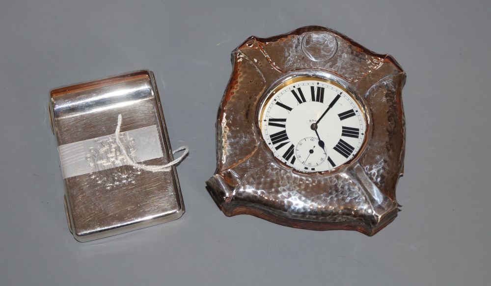 An Edwardian silver cigarette case wit patent pipe filler, Birmingham, 1909 and a silver mounted travelling watch case